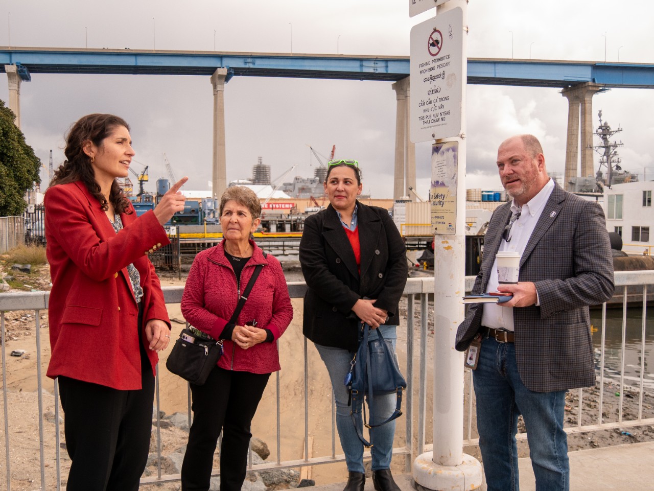Four people meet in the CAPP Portside Community next to the Coronado Bridge.