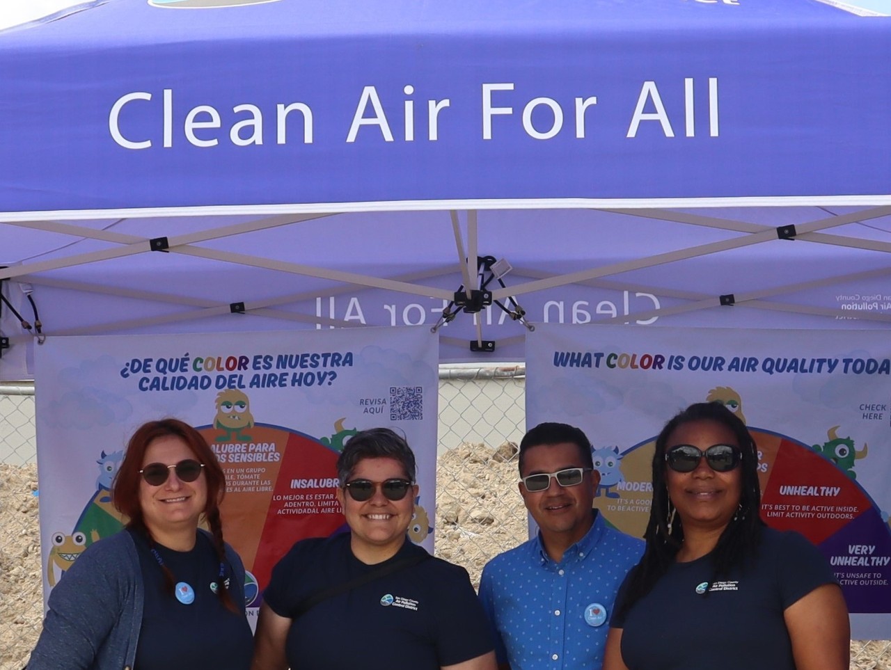 Member of the Office of Environmental Justice at a community event. 